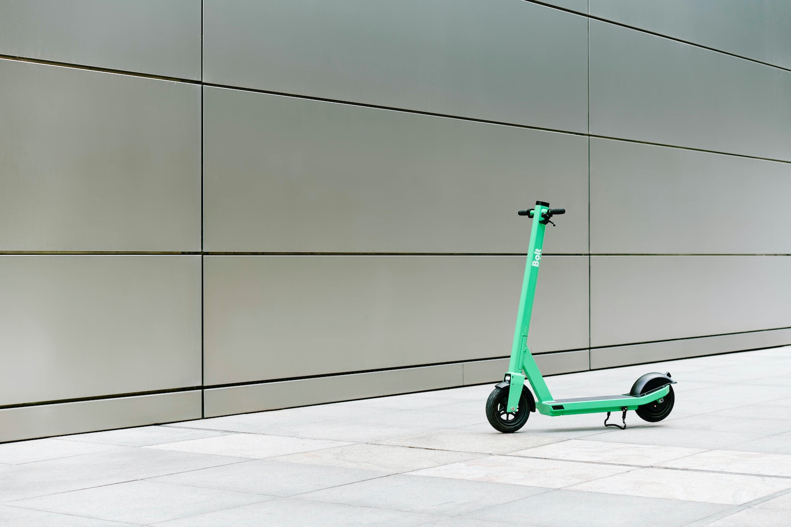 green and black kick scooter